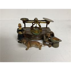 Morden & Co set of bras postal scales, together with three metal painted figures, comprising lion, monkey with a hat and woman holding an umbrella 
