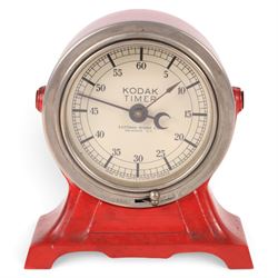 Eastman Kodak dark room timer, red metal body raised on base with swivel action, H14cm