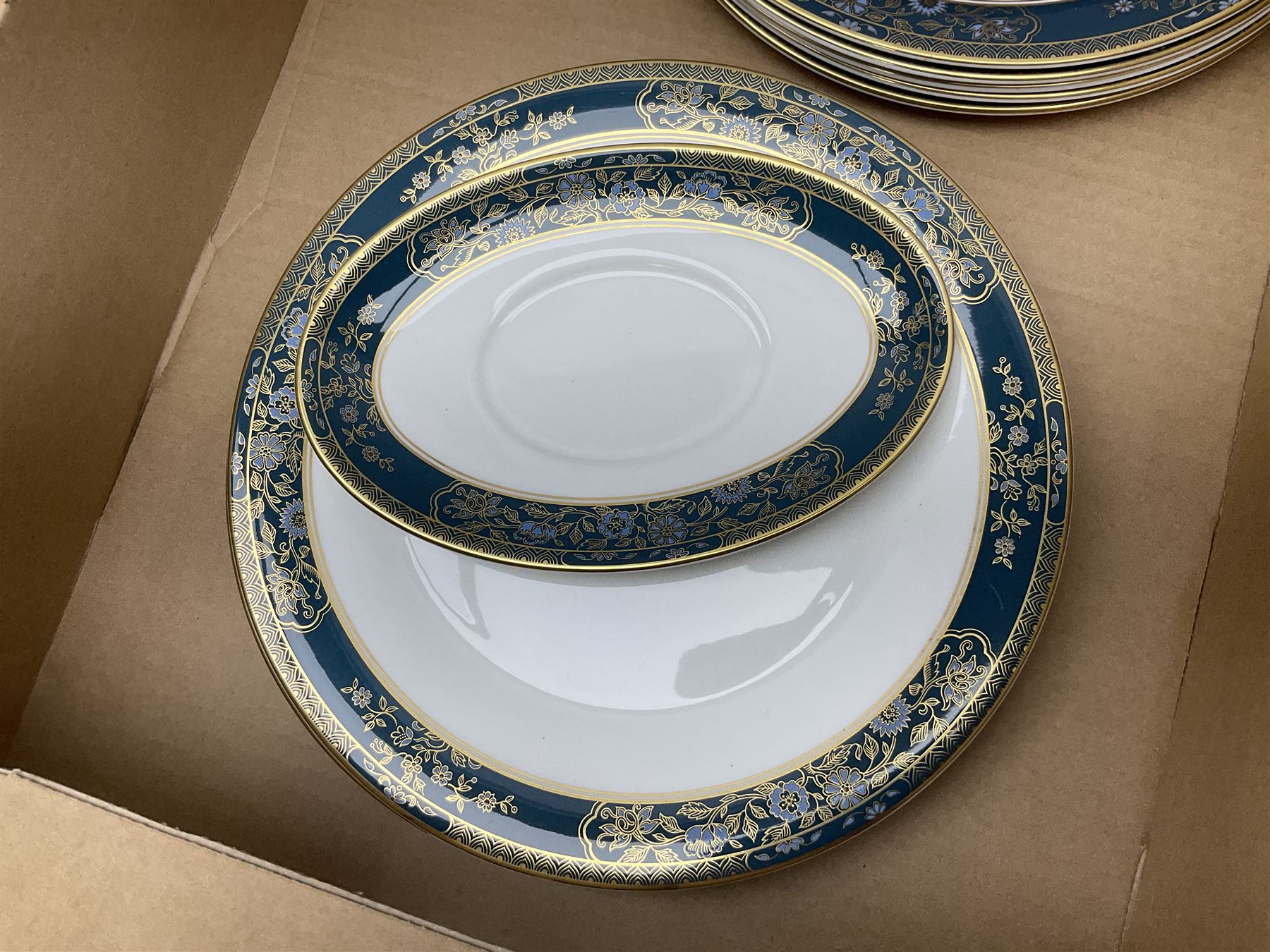 Royal Doulton Carlyle pattern part dinner service, including eight dinner plates, sixteen side plates, eight bowls, eight coffee cans and saucers etc (68)