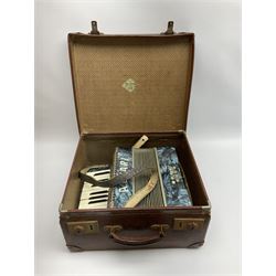 Small German Alvari piano accordion with blue pearline case, thirteen keys and eight buttons L30cm; in carrying case