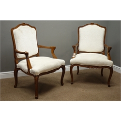  Pair French style walnut framed armchair, wide serpentine seat, upholstered in cream, on cabriole supports, W72cm  