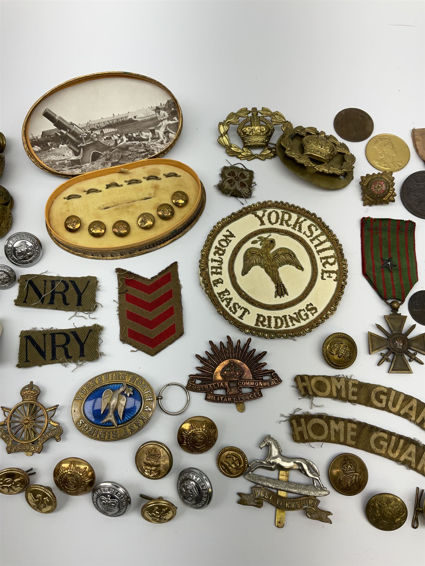 WW1 French Croix de Guerre medal dated 1914-18 with star on ribbon; Yorkshire North & East Ridings Provincial Grand Deacon masonic silver and enamel pendant and blazer badge; helmet plate, cap badges and assorted military buttons including boxed Royal Artillery set of waistcoat buttons etc