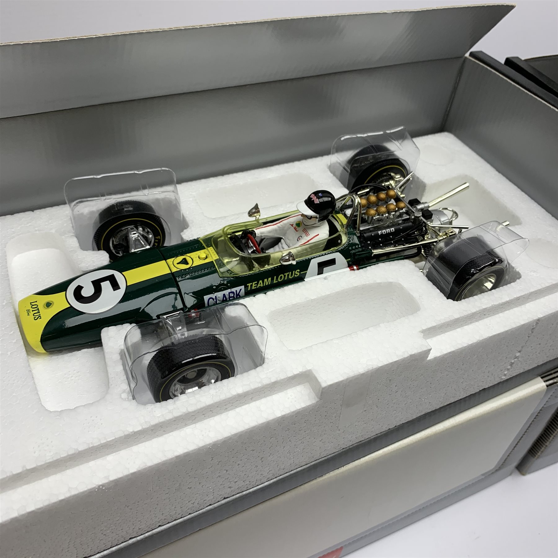 A-Model Classic Models - three 1:18 scale die-cast models of racing cars comprising Lotus 49B U.S.A. G.P. 68 Mario Andretti, Lotus 72D 'JPS' Winner British G.P. 72 Emerson Fittipaldi and Lotus 49 Winner British G.P. 67 Jim Clark, all boxed (3)