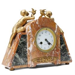 French Art Deco mantel clock, the white dial inscribed Loudeac, with bell strike in marble case surmounted by two gilt metal figures holding doves H26cm x W30cm