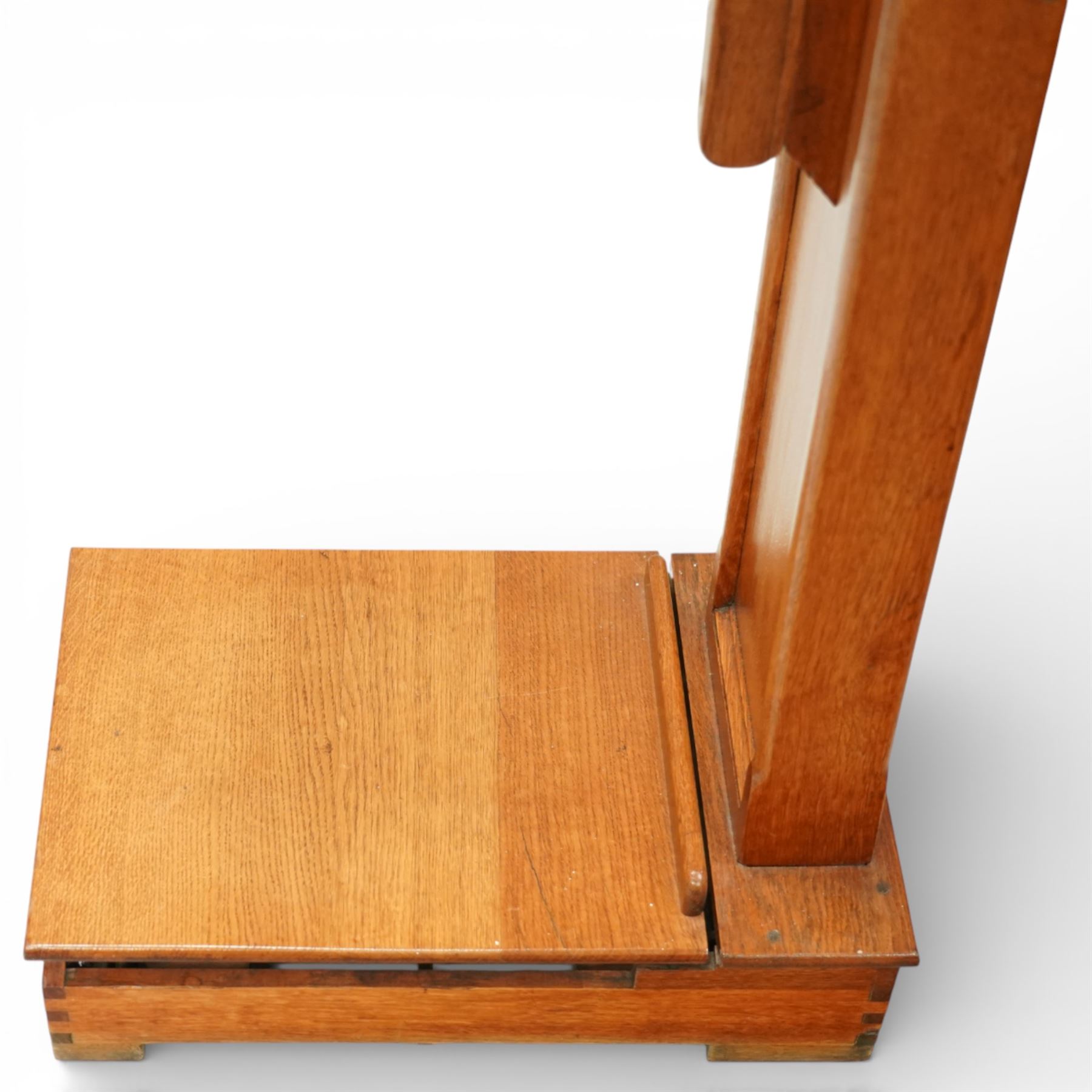 Early 20th century French oak height and balance scales, with graduated vertical rule, adjustable counterweight mechanism with brass and steel fittings, raised on a stepped rectangular oak base, bearing brass maker’s plaque, signed Kuhn & Fleichel, Jarville