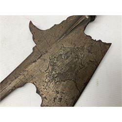 Moroccan jambiya dagger with 24.5cm plain curved blade stamped LONDON to the ricasso area, the hilt and scabbard overlaid with plain sheet brass to the back and ornate silver coloured metal to the front; waisted grip and arched pommel; two pyramid mounts to the scabbard L41cm overall; large billhook with curving blade and stacked leather washer grip; and a reproduction halberd blade (3)