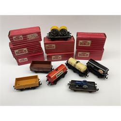 Hornby Dublo - 4646 Low-Sided Wagon D1 with cable drums; 4649 Low-Sided Wagon with tractor; 4656 16-Ton Mineral Wagon brown in Tony Cooper 1984 box; 4657 United Dairies Milk Tank Wagon; 4660 U.G.B. Sand Wagon; 4677 Tank Wagon 'Mobil' (D1); and 4680 Tank Wagon 'Esso' (Fuel Oil); all boxed (7)