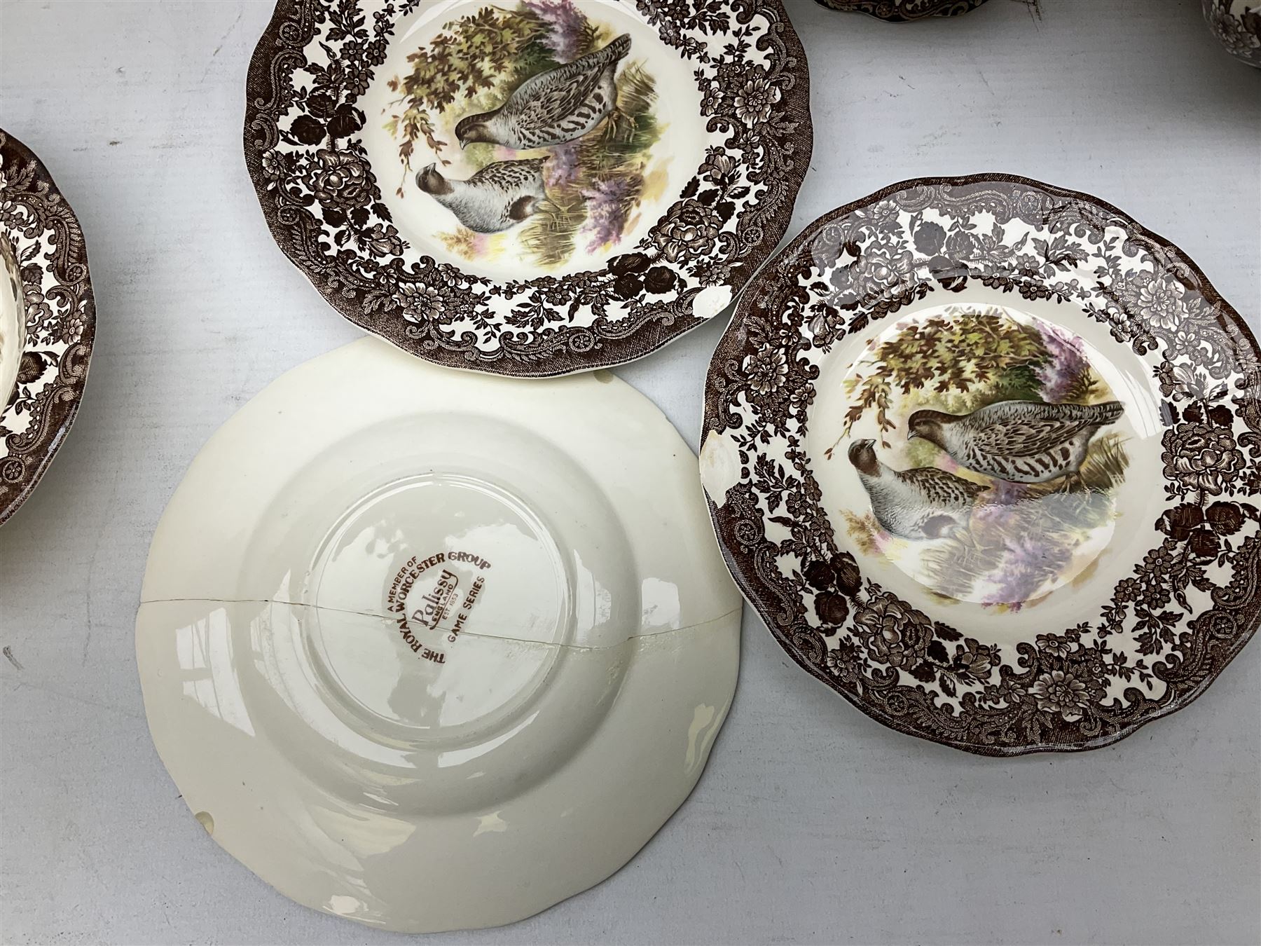Royal Worcester Palissy Game Series pattern tea and dinner wares, to include two teapots, coffee pot, twelve cups and saucers in two sizes, four dinner plates etc (40) 