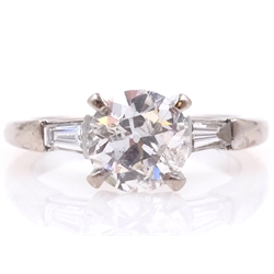  18ct white gold brilliant cut diamond ring with baguette diamond shoulders central diamond approx 0.9 carat stamped 750  