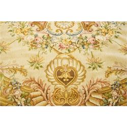 20th century French Aubusson style circular carpet, cream ground of Savonnerie design with scrolling floral and scallop motifs