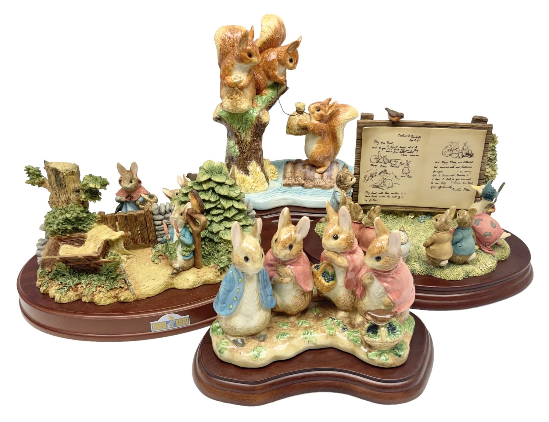 Four Border Fine Arts Beatrix Potter figures, comprising Tableau created to commemorate the Millenium together with a Border Fine Arts Limited Edition no 669814, The Tale of Peter Rabbit Tablet A1306, Four Little Rabbits A2442 and Sailing Home A2443