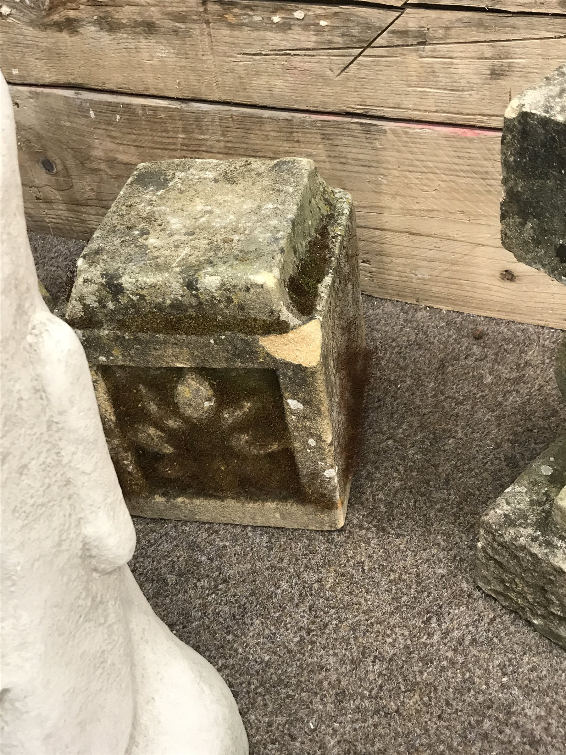 Collection of various stone and composite stone garden ornaments including; cat figure, stone two piece bird bath, Easter island head, tortoise etc.. (11)