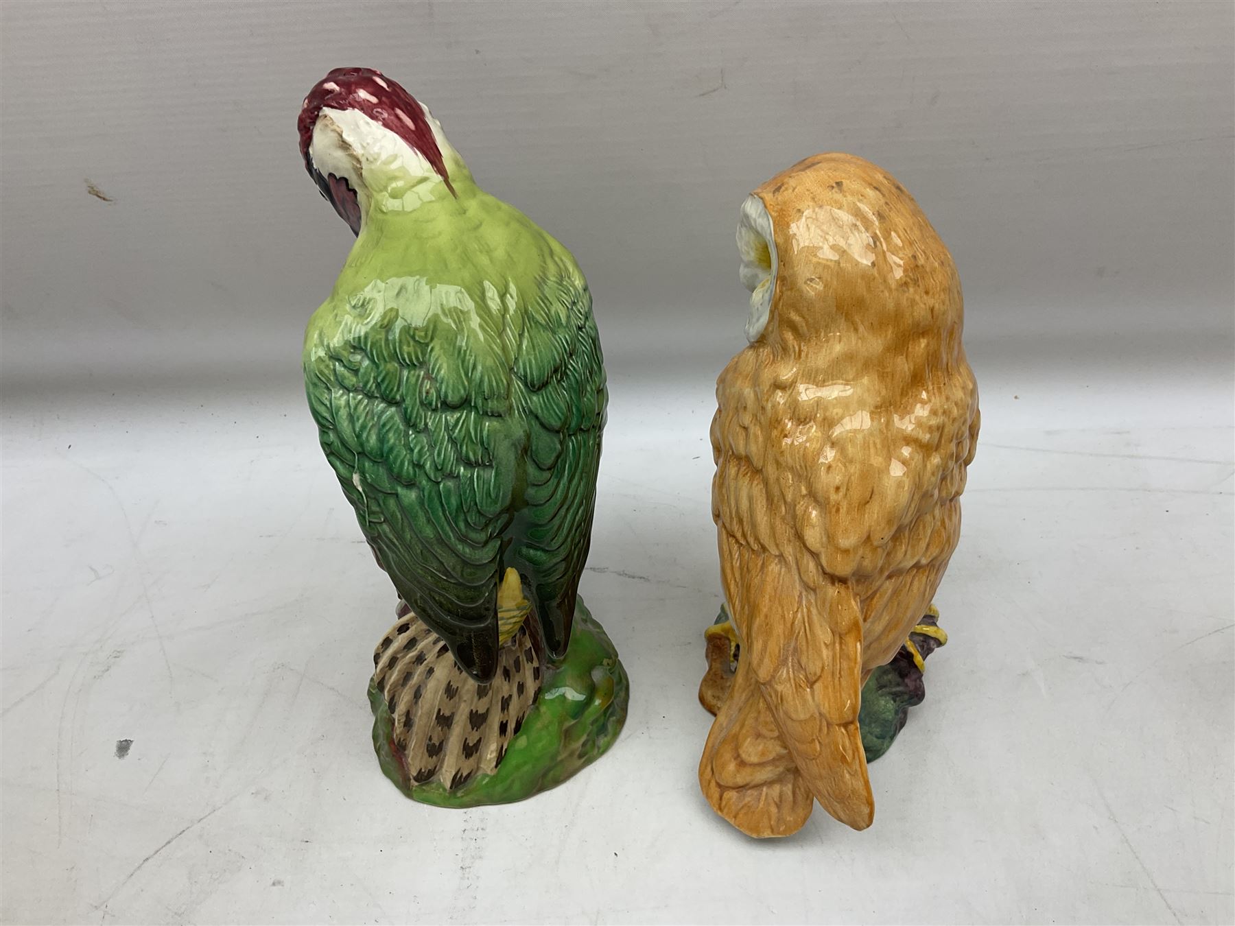 Six Beswick bird figures comprising large barn owl no.1046, small barn owl no.2026, woodpecker no.1218, pheasant no. 1226b and two small pheasants no.767a, tallest H22cm  