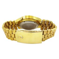 Bulova Accutron gentleman's gold-plated and stainless steel quartz wristwatch, Ref. 7083-5, Cal 21826, champagne dial with baton hour markers and day / date aperture, on original gold-plated bracelet, with fold-over clasp, boxed