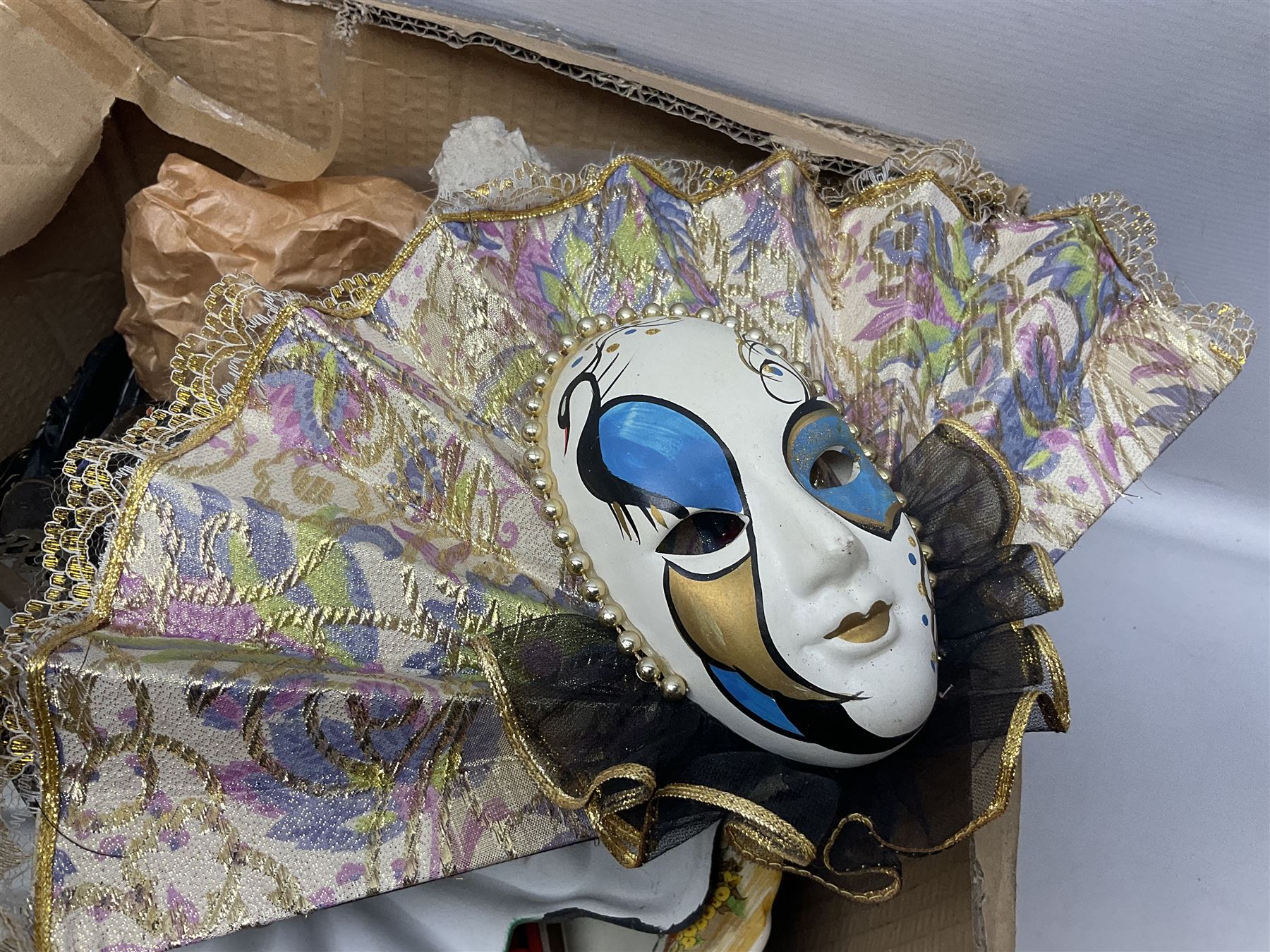 Collection of decorative Venetian masks together with other collectables, in two boxes 