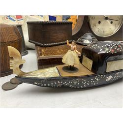 Mid 20th century cigarette box in the form of a gondola, the faux tortoiseshell with mother of pearl inlay (a/f), cased mantel clock with silvered numerical dial, oak lidded tea jar caddy, oak box, silver-plate cutlery, quantity of records, Smith's empire miniature clock, stamps etc