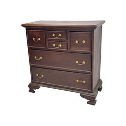 Georgian design mahogany chest, fitted with six drawers, on ogee bracket feet