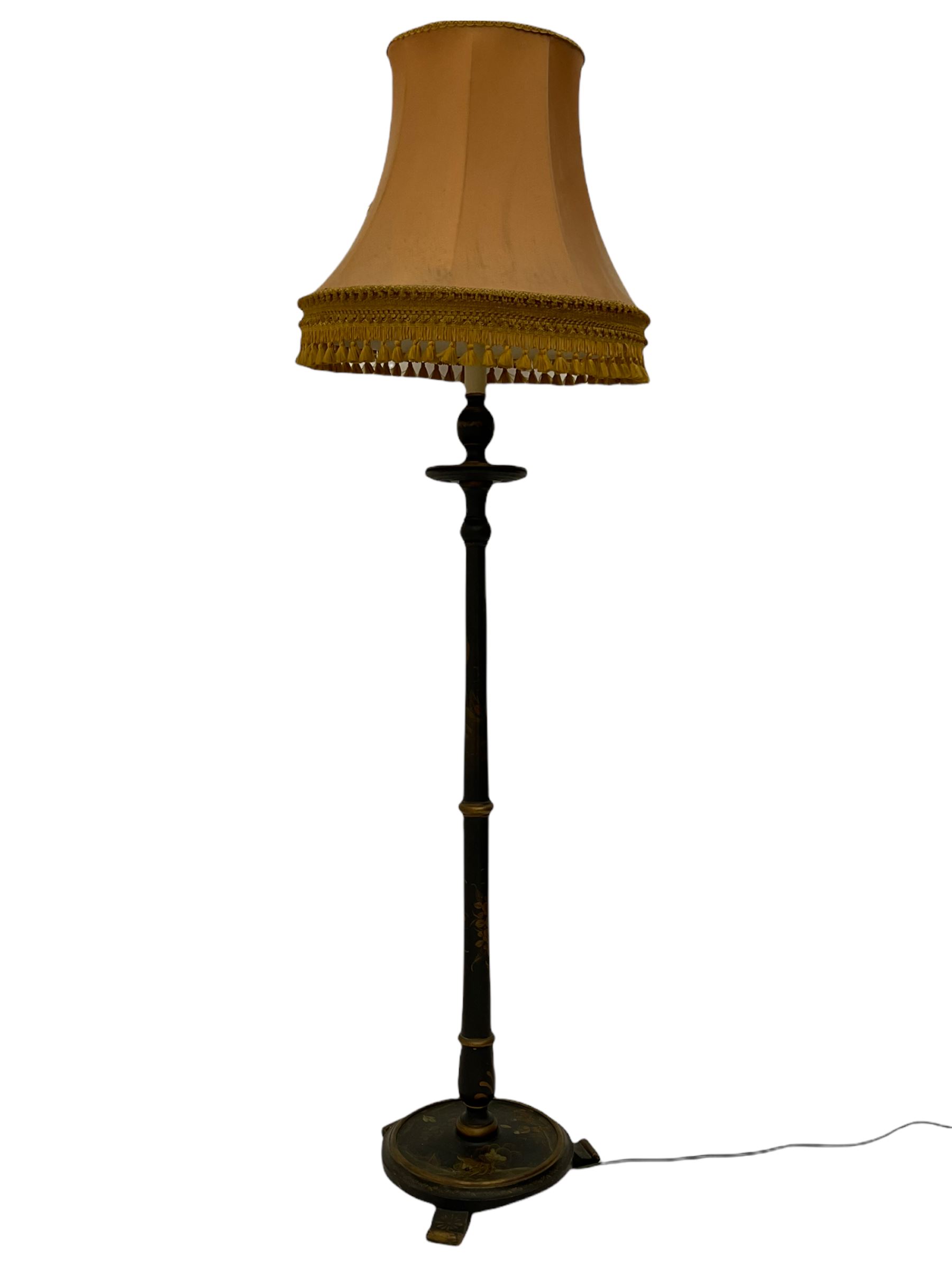 Late 20th century chinoiserie standard lamp, the circular base decorated with raised gilt figural scenes, H153cm (measurement excluding shade and fitting)