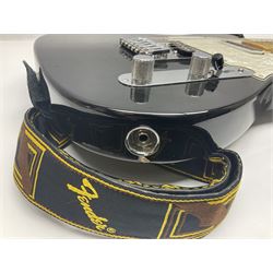 2009 Fender Telecaster electric guitar in black, retro fitted with Charlie Christian copy pick-up, serial no.MZ9546274; L98cm; in Fender soft carrying case