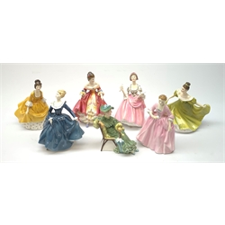 A group of seven Royal Doulton figurines, comprising Southern Belle HN2229, A Hostess of Williamsburg HN2209, Ballad Seller HN2266, Coraline HN2307, Fragrance HN2334, Ascot HN2356, Lynne HN2329. (7). 
