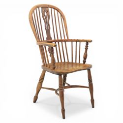Early 20th century yew wood Windsor armchair, hooped back with spindle supports and shaped...