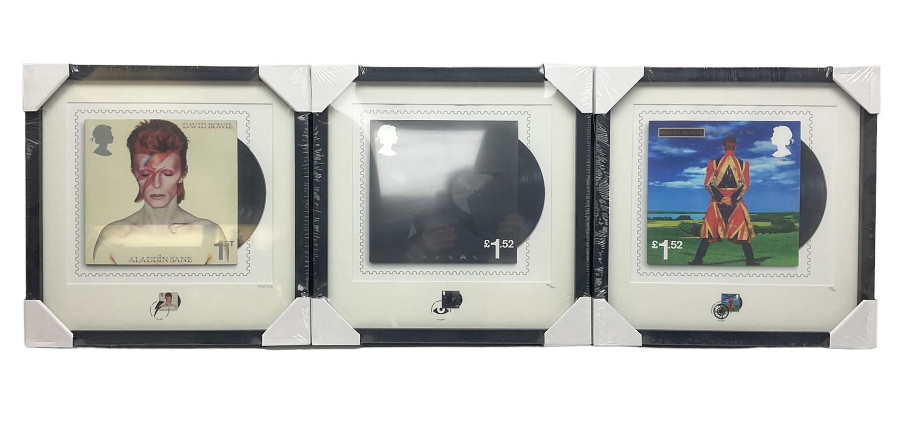 Set of three Royal Mail David Bowie limited edition album stamp prints, comprising Aladdin Sane, Blackstar and Earthling, all framed and in original packaging, H43cm W43cm