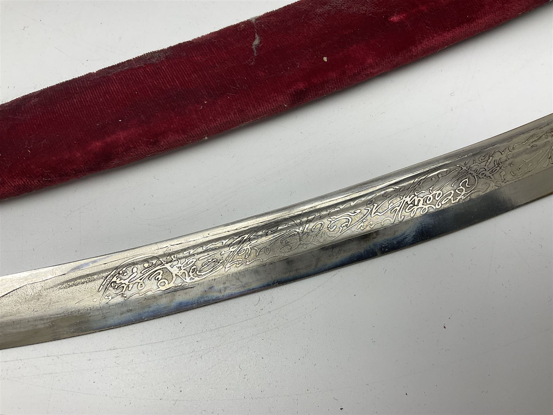 Late Victorian British Military gymnasium practice sword with 85.5cm fullered blunt pointed narrow straight blade, pierced bowl guard and chequered wooden grip L103cm overall; Leon Paul fencing foil with shaped grip and touche wiring; and two reproduction Indian tulwar swords with scabbards (4)