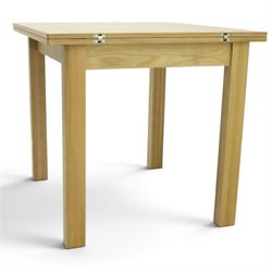Contemporary light oak extending dining table, the square top with pull-out and fold-over action, raised on square supports