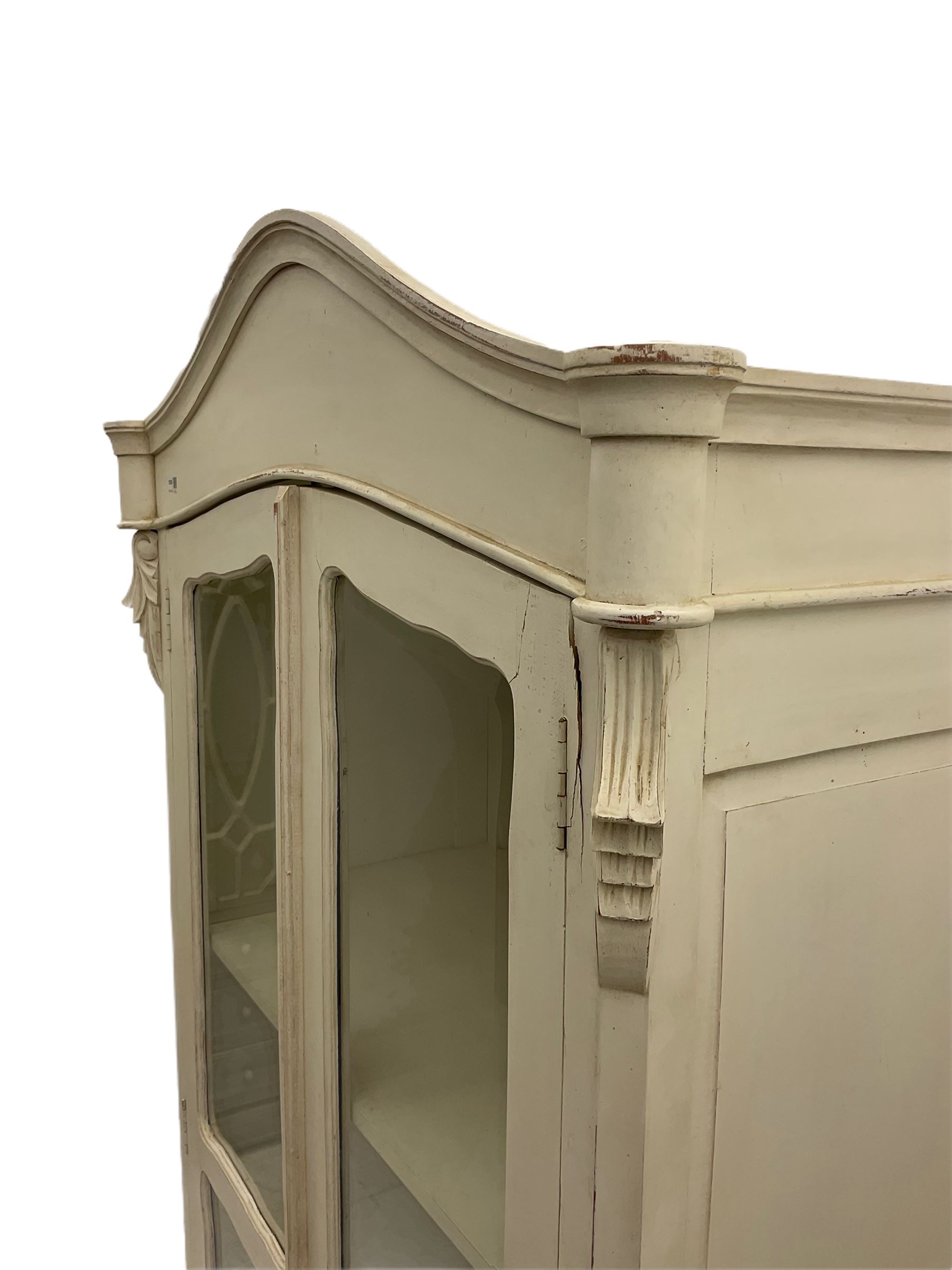 French white painted armoire cabinet, fitted with two glazed display doors