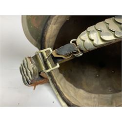 Early 20th century French mounted gendarme's helmet, brass with nickel-silver mountings, broad band embossed with fused grenade, high comb with the face of the gorgon Medusa at the peak and with a black horse hair crest, plume socket at the left, leather-backed nickel-silver chin scales with lion mask mounts.