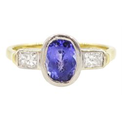 18ct gold three stone oval cut tanzanite and radiant cut diamond ring, hallmarked, tanzanite approx 1.10 carat, total diamond weight approx 0.40 carat