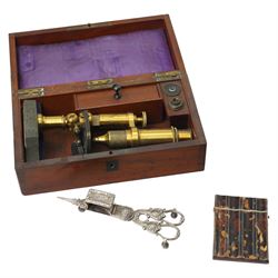 Victorian brass and black japanned microscope with accessories in original mahogany box; s...