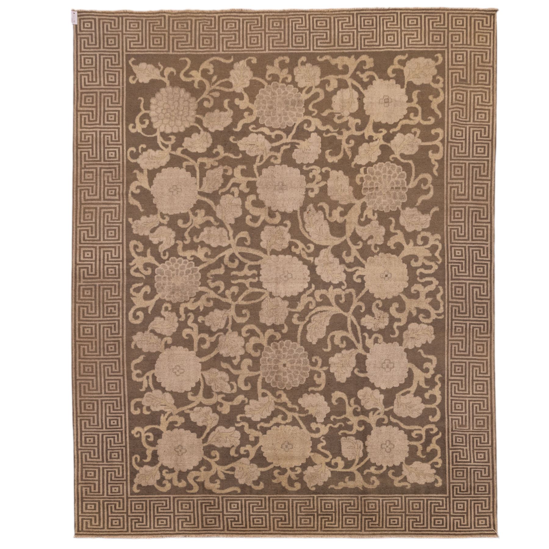 Indian Khetar hand knotted carpet, the brown ground decorated with an all over scrolling foliate and palmette design, enclosed within a conforming floral border with guard stripes