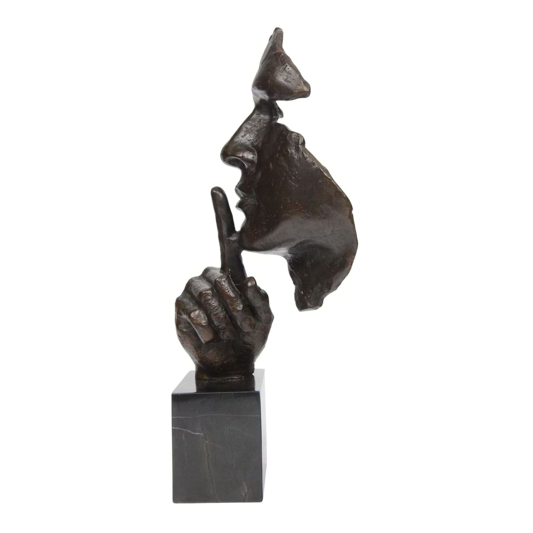 After Salvador Dali (Spanish 1904-1989): The Silence, bronze figure of face with finger raised to lips, H48cm