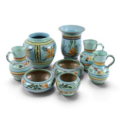 Hartrox Stoneware comprising three jugs, two vases and three bowls, all with green, blue a...