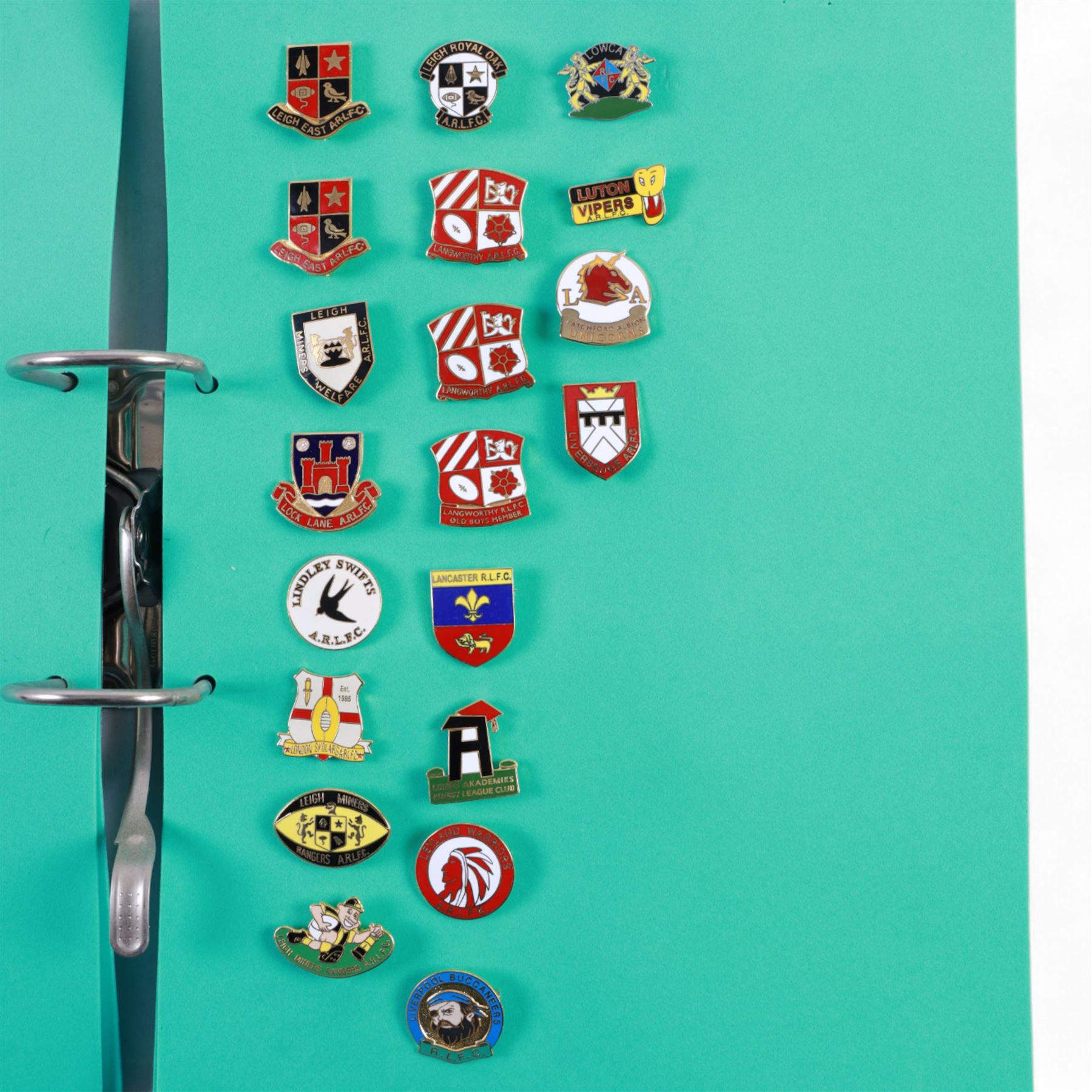 Amateur rugby league enamel badge collection, teams including Birmingham Bulldogs, Bridlington, Dudley Hill, Duke of York, Edinburgh Eagles, Guiseley, Rangers, Huntingdon, Keighley Town, Leigh Miners, Pilkington Recs, St Josephs, Thornhill Trojans, West London Sharks etc, all displayed in three folders and six amateur league badges from Leeds & District, Hull & District, York & District, Warrington, Lancashire County and Yorks County in box display, (approximately 270)