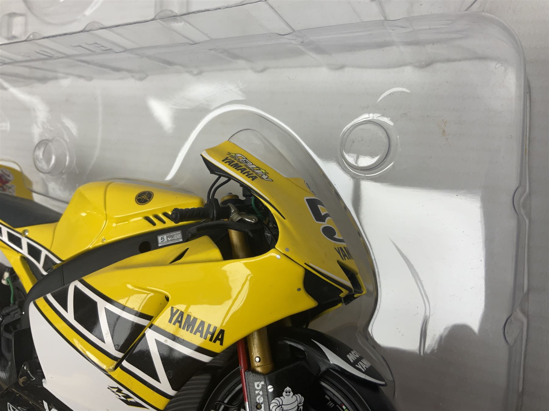 Three Minichamps 1:12 scale die-cast motorcycles - Yamaha YZR 500 Max Biaggi 2000; Yamaha YZR-M1 Colin Edwards Fiat Yamaha Team MotoGP 2007 GP Australia; and Yamaha YZR 500Team Yamaha Max Biaggi 500ccGP 2001; all boxed (3)