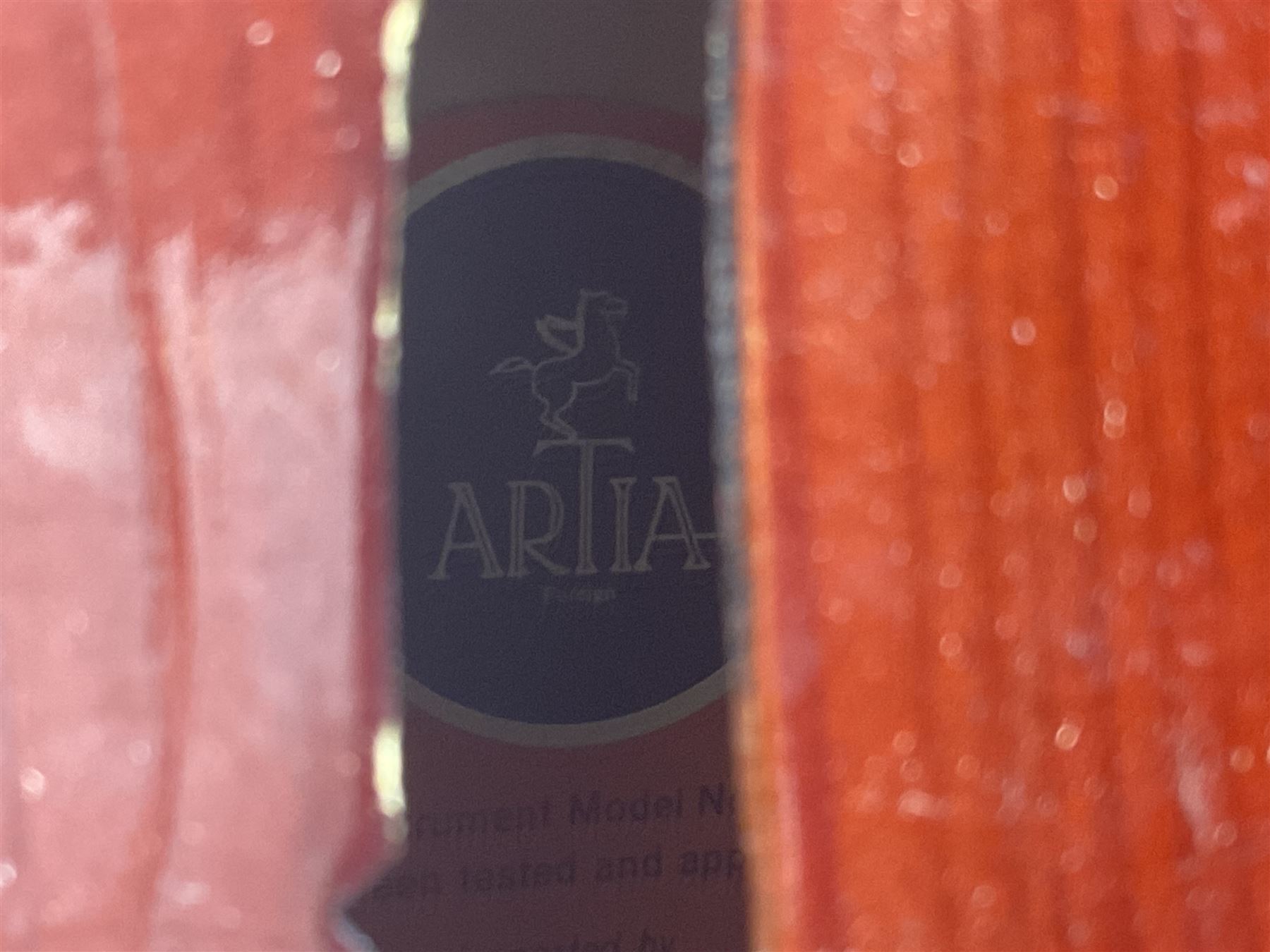 Two student half-size cellos - Boosey & Hawkes Artia with 65cm one-piece back and spruce top; bears maker's label; L104cm overall; and Romanian with 65.5cm two-piece maple back and ribs and spruce top; bears label; L108.5cm overall; each in soft carrying case with two bows (2)