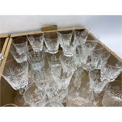 Collection of glassware, to include foot bowl with matching dishes, claret jug, three cut glass decanters, ser of wine glasses etc, in two boxes