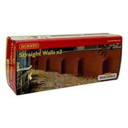 Ten Hornby '00' gauge Skaledale buildings, comprising two R8744 Straight Walls, R8564 Model Shop, R9768 The Pharmacy, R8501 Raven Cottage, R8515 Clovelly Cottage, R8626 Country Fire Station, R8588 Weighbridge & Scales, R8638 Platform & Shelter and R9763 Off Your Head Barbers Shop, all boxed