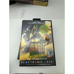 Eighteen Sega Mega Drive games, including Sonic The Hedgehog, Sonic The Hedgehog 2, Alienstorm, Desert Strike, Fatal Rewind, Road Rash etc, all boxed, together with a Sega Mega Drive controller, cartridge converter and an arcade power stick controller