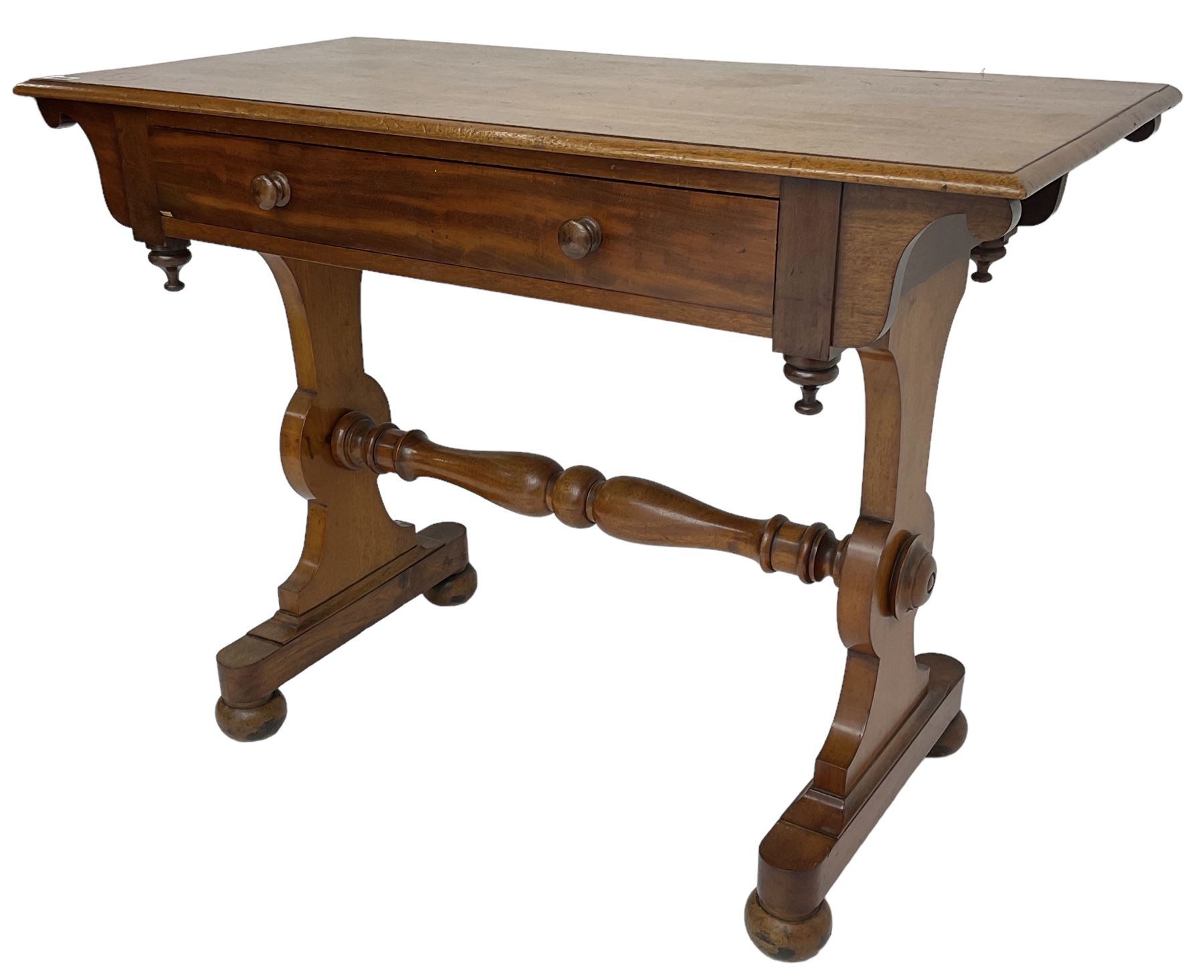 Victorian design mahogany side table, fitted with single drawer, raised on shaped end supports with bun feet, united by turned stretcher