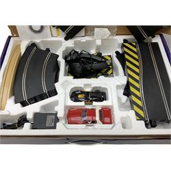 Scalextric - Marks & Spencer Starsky & Hutch set with '76 Gran Torino and Chevrolet Corvette cars, boxed; an earlier Tri-ang Scalextric 'Set 30' Model Motor Racing set containing Lotus and Cooper racing cars with controllers, track, figures and instruction pack, boxed; and a Scalextric catalogue Fifth edition c1964