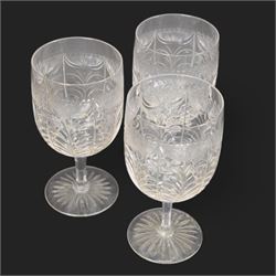 Six cut glass goblets, each with etched and cut floral decoration, together with eight similar bowls, a pair of Waterford Crystal glasses, eight champagne coupes etched with Greek Key border and four etched with floral border