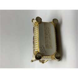 19th century Coalport bough pot, circa 1820, of bombe form, the body with twin handles surmounted by two birds and raised upon four feet modelled as swans, hand painted with two panels depicting an urn of flowers set against a mountainous landscape, the whole heightened in gilt throughout, H13cm L21cm