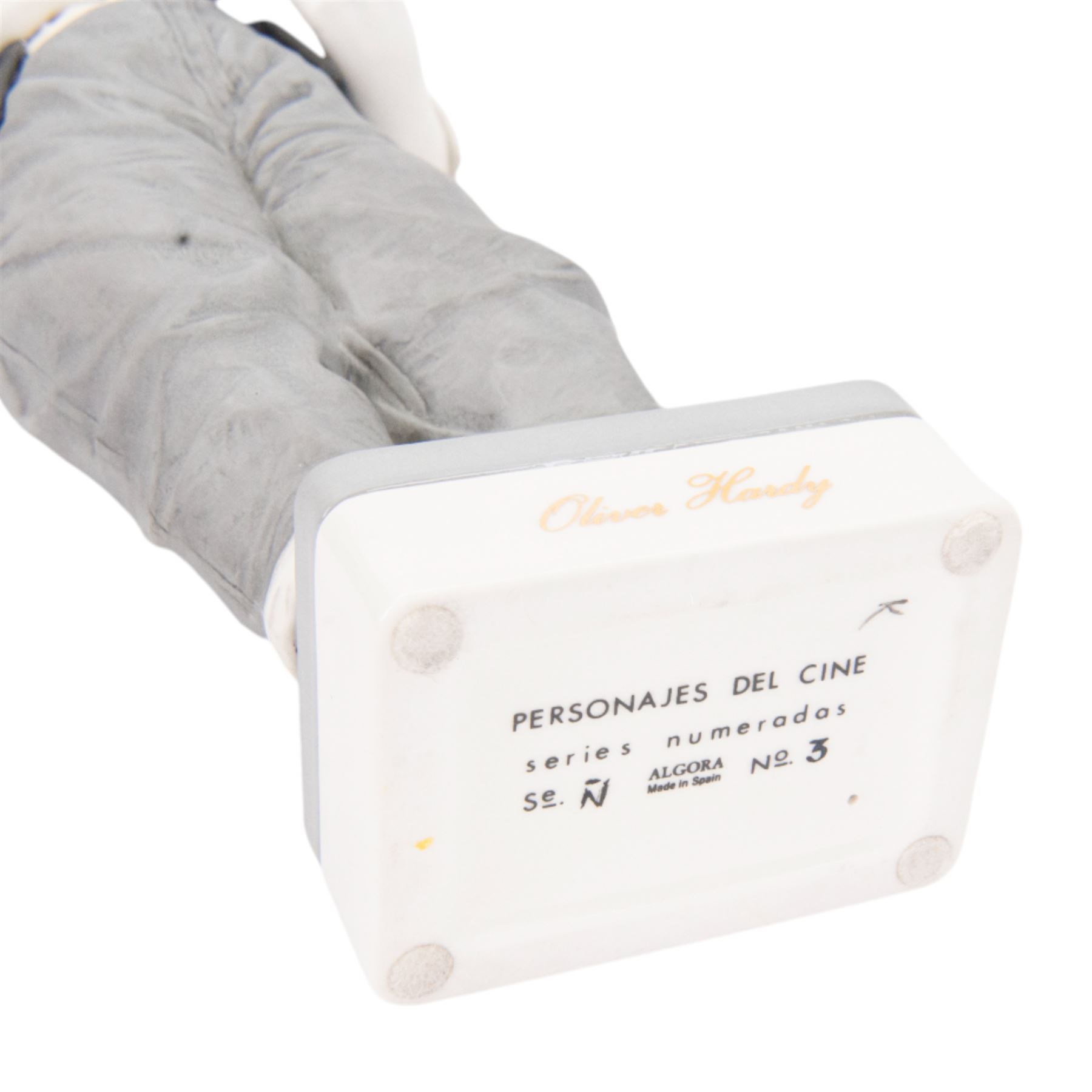 Pair of Spanish Algora Personajes Del Cine figures, modelled as Stan Laurel and Oliver Hardy, with printed marks beneath, both with certificates of authenticity, H37cm