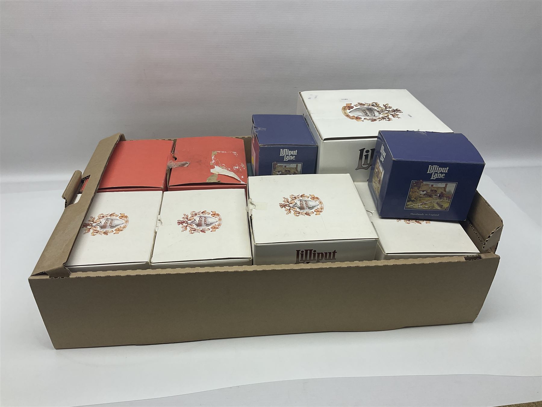 Ten Lilliput Lanes, comprising from Midlands Region Witham Delph, Jun and Disorderly, From South West Region Puffin Row, Moonlight Cove, The Cuddy, and from South West Region, The Rustlings, Saxton Cottage (1988), Marigold Meadow, Calendar Cottage and Little Lupins, all with boxes and deeds 