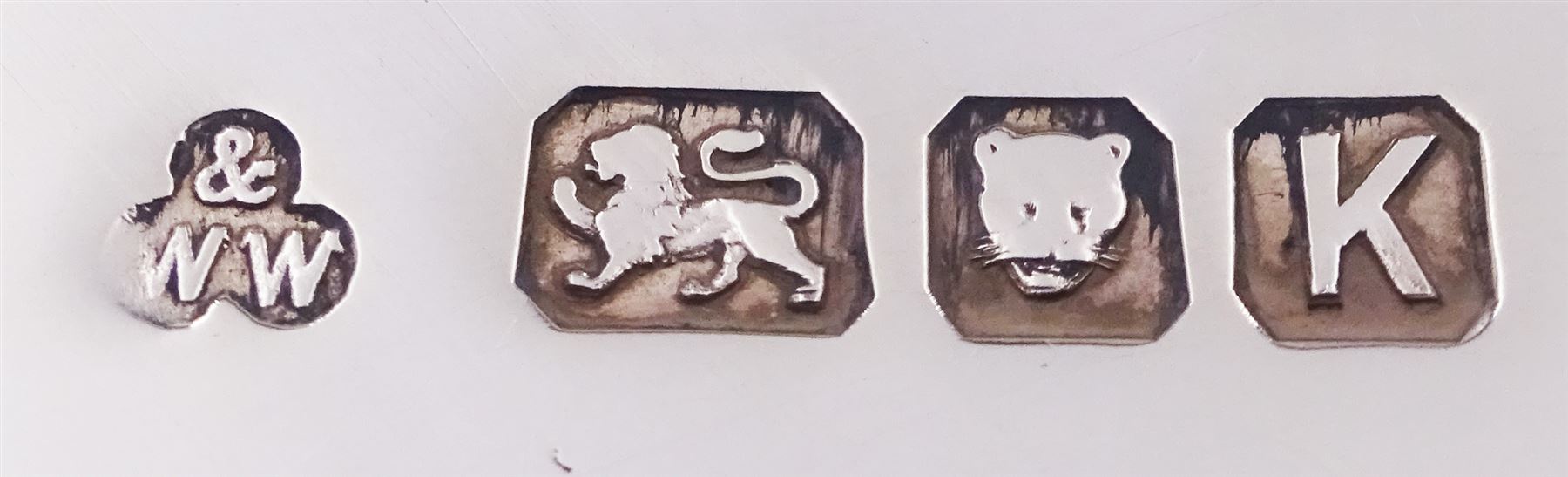 Large modern silver Quaich, of circular form with twin handles cast with stylised dragon motifs, hallmarked Birmingham 2009, makers mark W&W, D18cm, approximate weight 11.14 ozt (346.8 grams)