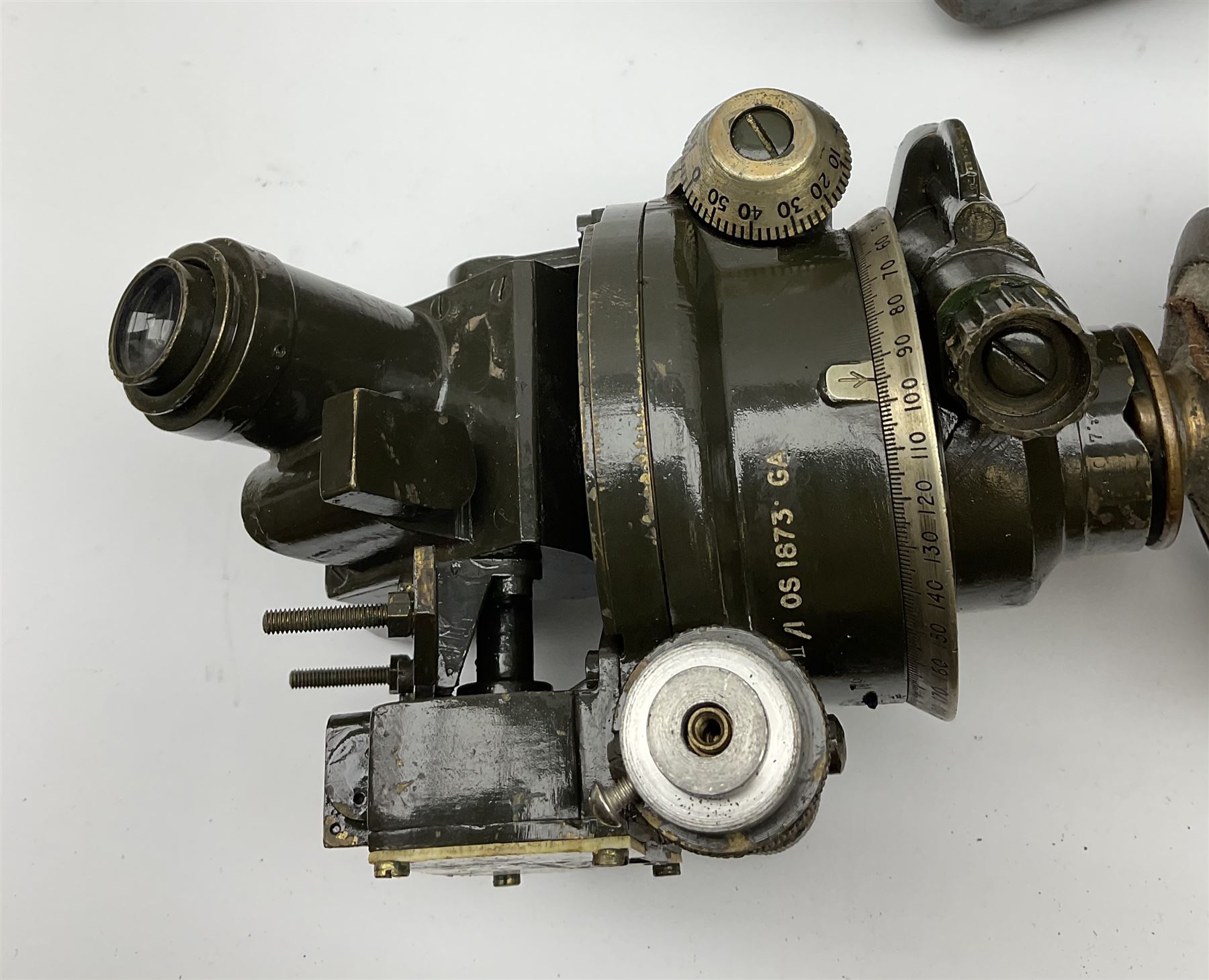 WW2 green painted brass military artillery theodolite, marked 'Director No.7 (Mk.2) OS 1873 GA', dated 1942, serial no.11435, on oak and brass telescopic tripod with green painted metal carrying case; together with five additional unrelated oak and brass telescopic tripod legs