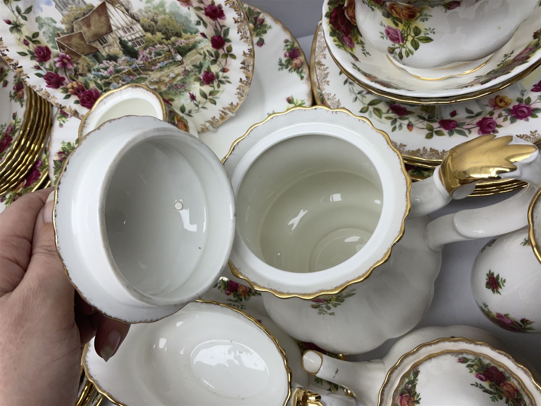 Royal Albert Old Country Roses pattern part tea and dinner service, including coffee pot, miniature teapot and stand, eight dinner plates, cake stand, sauce boat etc 